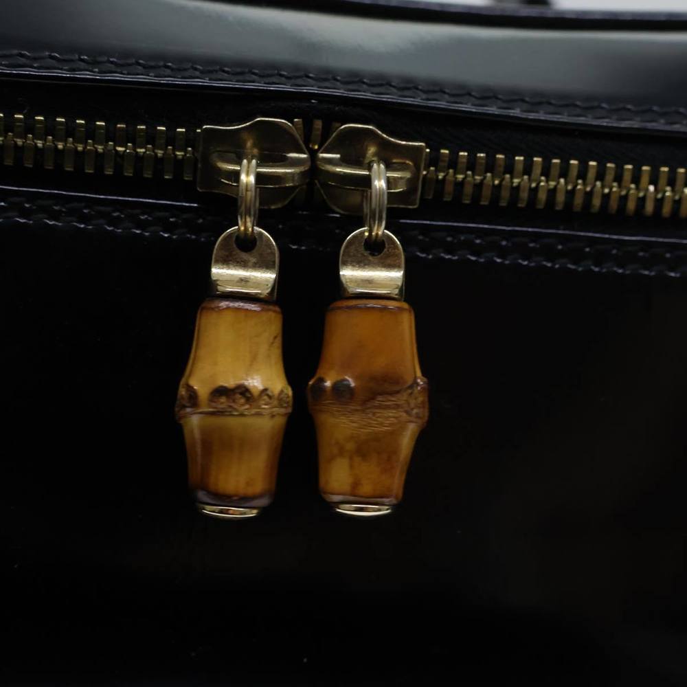 Gucci Black Cosmetic Bag with Gold Accents - Picture 13 of 16